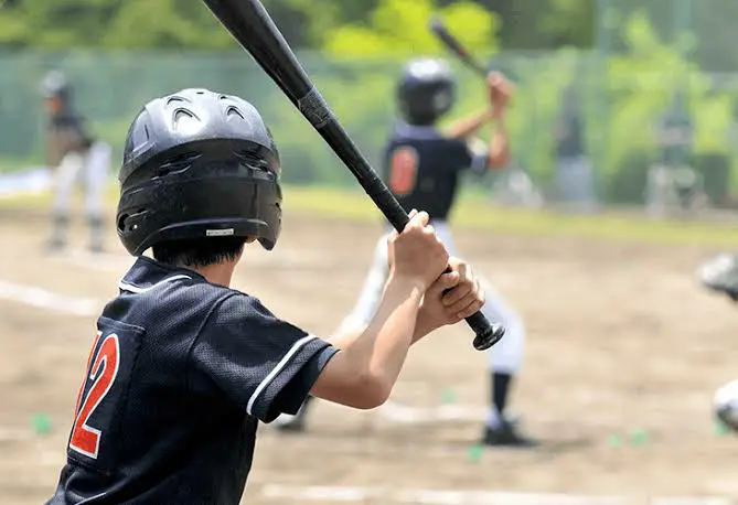 Practice good grip of softball handle